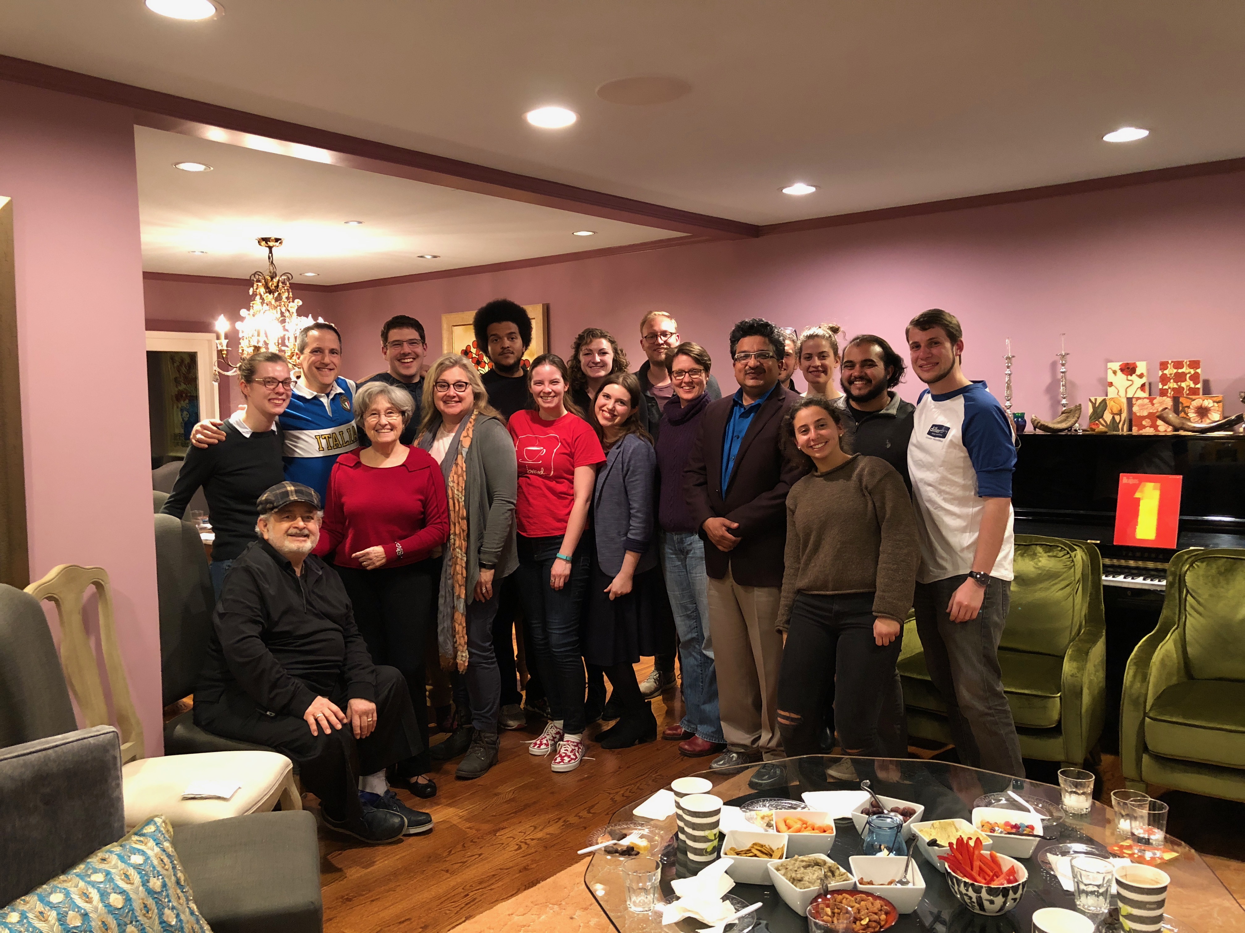 Group of diverse people posing for a picture during an event