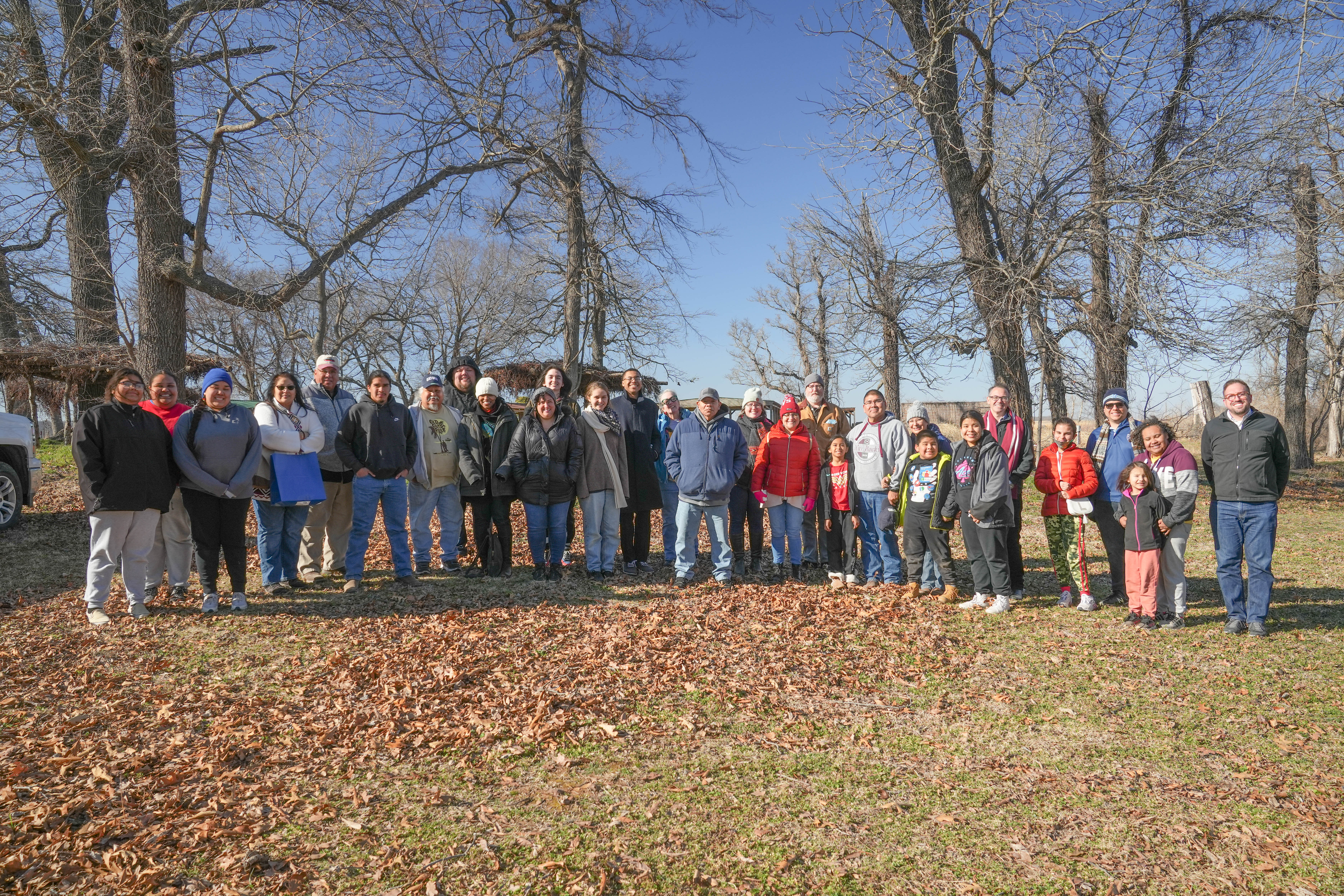 In March 2022, Mekko Chebon Kernell and his family welcome the Emory Indigenous Language Path Working Group for a visit, conversation, and lunch at the Helvpe Ceremonial Grounds in Hanna, OK.